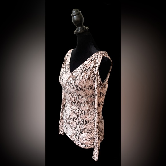 Jennifer Lopez: Brown and White Animal Print Cold Shoulder Blouse - Picture 7 of 17